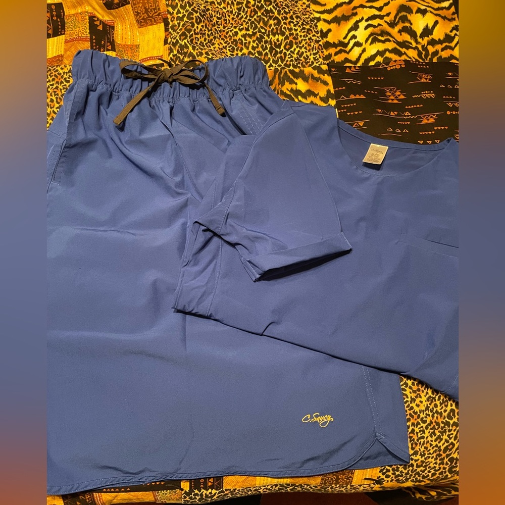 C. Saucy The Anywhere Collection scrub top and skirt